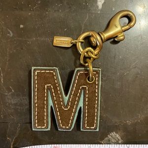 Coach accent piece”M”